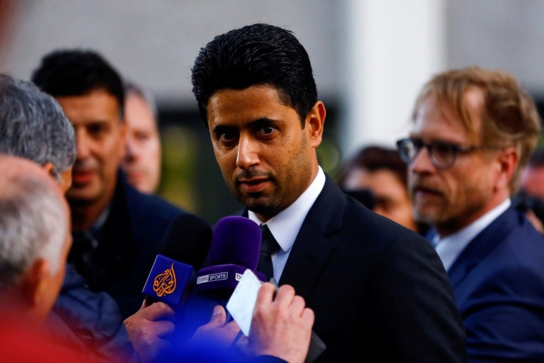 Nasser Al-Khelaifi (C), CEO of Qatar's beIN Media and president of French soccer club Paris St Germain (PSG) talks to the media after he was questioned as part of a criminal investigation into World Cup broadcasting deals, in Bern, Switzerland October 25, 2017. REUTERS/Arnd Wiegmann