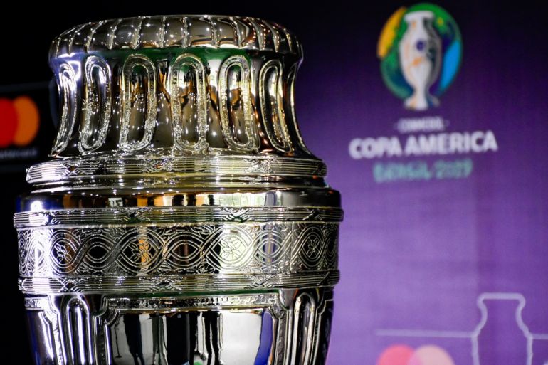 The Copa America trophy in Colombia- - BOGOTA, COLOMBIA - MAY 07: The Copa America trophy is exhibited at the Banco de Bogota building during the 'Trophy Tour' in Bogota, Colombia on May 7, 2019.