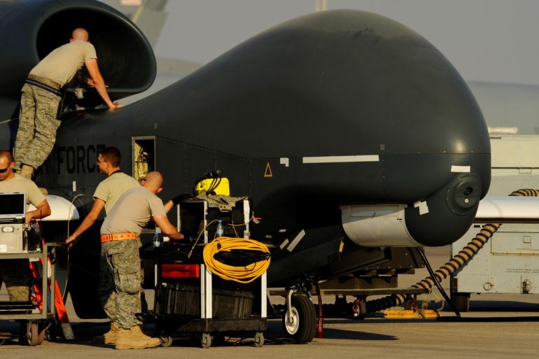 U.S. Air Force maintainers prepare a U.S. military drone RQ-4A Global Hawk for takeoff at an undisclosed location in Southwest Asia, December 2, 2010. Picture taken December 2, 2010. Courtesy Eric Harris/U.S. Air Force/Handout via REUTERS ATTENTION EDITORS - THIS IMAGE HAS BEEN SUPPLIED BY A THIRD PARTY.
