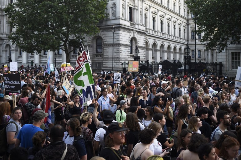 LONDON, ENGLAND - JULY 24: Protestors are seen in Whitehall after Prime Minister Boris Johnson arrives back at Downing Street on July 24, 2019 in London, England. Boris Johnson, MP for Uxbridge and South Ruislip, was elected leader of the Conservative and Unionist Party yesterday receiving 66 percent of the votes cast by the Party members. He will take the office of Prime Minister this afternoon after outgoing Prime Minister Theresa May takes questions in the House of Commons for the last time. on July 24, 2019 in London, England. (Photo by Peter Summers/Getty Images)