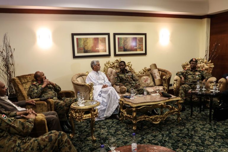 Peace talks in Sudan postponed to Sunday- - KHARTOUM, SUDAN - JULY 13: AU Special Envoy Mohamed El Hacen Lebatt (left 4), Spokesman of Sudan's Transitional Military Council Shams-Eddin Kabashi (right 3) and Yasir Alatta, a leading member of the Transitional Military Council (right 2) are seen during their meeting in Khartoum, Sudan on July 13, 2019.