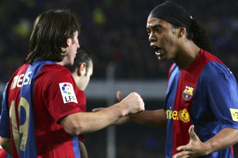 BARCELONA, SPAIN - MARCH 10: Lionel Messi (L) of Barcelona celebrates with Ronaldinho after scoring Barcelona's 2nd goal during the Primera Liga match between Barcelona and Real Madrid at the Nou Camp stadium on March 10, 2007 in Barcelona, Spain. (Photo by Denis Doyle/Getty Images)