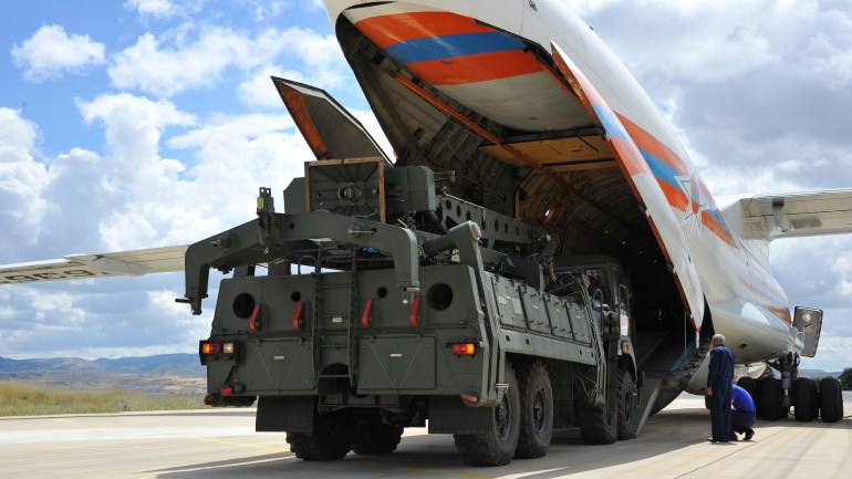 First parts of a Russian S-400 missile defense system are unloaded from a Russian plane at Murted Airport, known as Akinci Air Base, near Ankara, Turkey, July 12, 2019. Turkish Military/Turkish Defence Ministry/Handout via REUTERS ATTENTION EDITORS - THIS PICTURE WAS PROVIDED BY A THIRD PARTY. NO RESALES. NO ARCHIVE