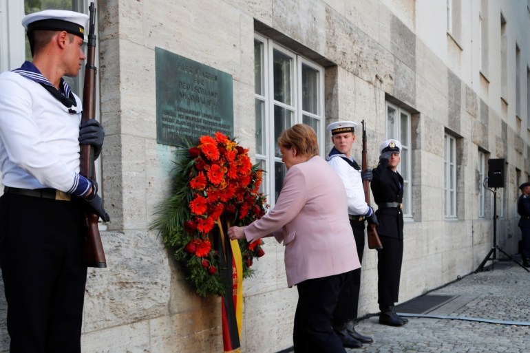 German Chancellor Angela Merkel takes part in a wreath-laying during a ceremony to mark the 75th anniversary at the site where a group of officers led by Claus Schenk Graf von Stauffenberg was shot after their failed July 20, 1944 attempt on the life of Adolf Hitler, in the