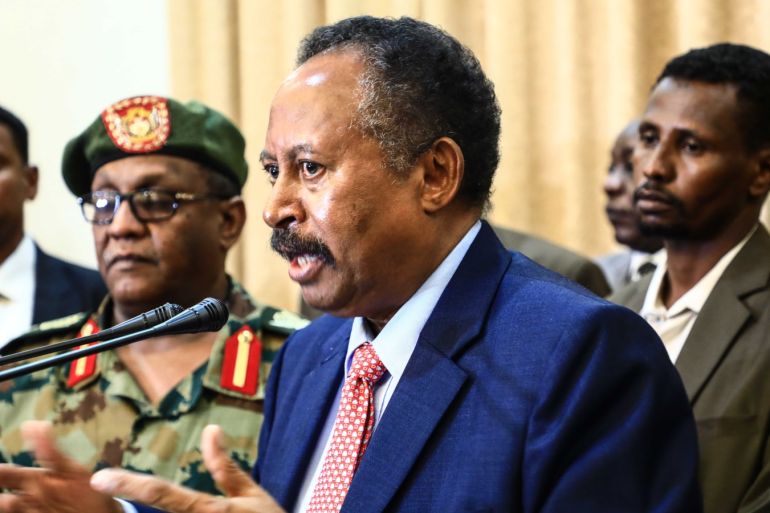 Member of Sudan's 'sovereign council' Abdullah Hamadok- - KHARTOUM, SUDAN - AUGUST 21: Member of Sudan's 'sovereign council' Abdullah Hamadok holds a press conference after swearing in ceremony at Presidential Palace in Khartoum, Sudan on August 21, 2019.
