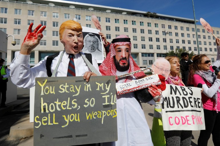 Activists from the group "Code Pink" dressed as U.S. President Donald Trump and Saudi Crown Prince Mohammad bin Salman participate in a demonstration calling for sanctions against Saudi Arabia and against the disappearance of Saudi journalist Jamal Khashoggi in front of the U.S. State Department in Washington, U.S., October 19, 2018. REUTERS/Kevin Lamarque