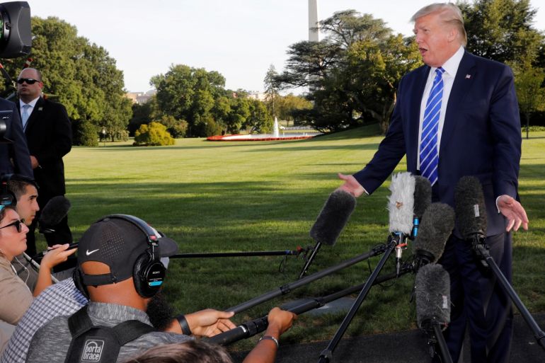 U.S. President Donald Trump speaks with reporters on the South Lawn of the White House in Washington, U.S., before his departure to Camp David, August 30, 2019. REUTERS/Yuri Gripas