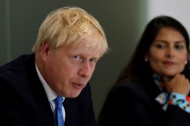 Britain's Prime Minister Boris Johnson speaks alongside Home Secretary Priti Patel during the first meeting of the National Policing Board at the Home Office in London, Britain July 31, 2019. Kirsty Wigglesworth/Pool via REUTERS