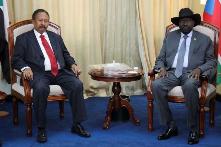 Sudan's prime minister Abdalla Hamdok and South Sudan's President Salva Kiir Mayardit are seen during their meeting in Juba, South Sudan, September 12, 2019.REUTERS/Jok Solomun