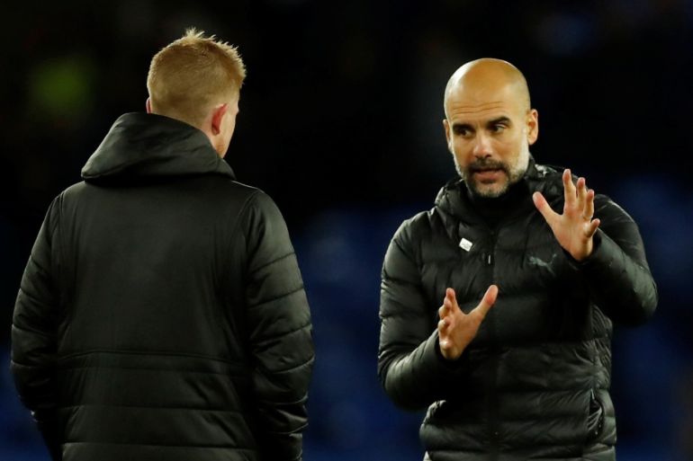 Soccer Football - Premier League - Everton v Manchester City - Goodison Park, Liverpool, Britain - September 28, 2019 Manchester City's Kevin De Bruyne with manager Pep Guardiola after the match Action Images via Reuters/Andrew Boyers EDITORIAL USE ONLY. No use with unauthorized audio, video, data, fixture lists, club/league logos or