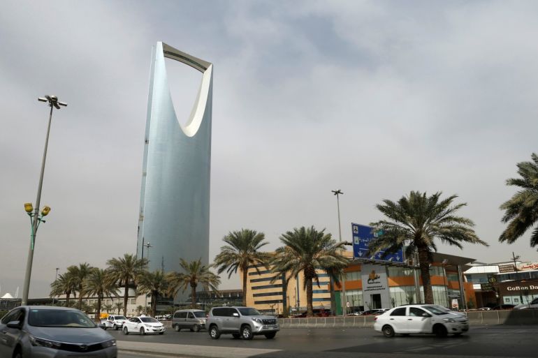 Cars drive past the Kingdom Centre Tower in Riyadh, Saudi Arabia, January 30, 2018. REUTERS/Faisal Al Nasser