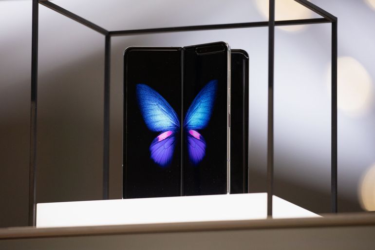 epa07819240 The Galaxy Fold and Fold 5G are presented during a presentation of the new releases of Samsung at the International Funkaustellung Berlin (IFA), an international consumer electronics fair, in Berlin, Germany, 05 September 2019. The new...