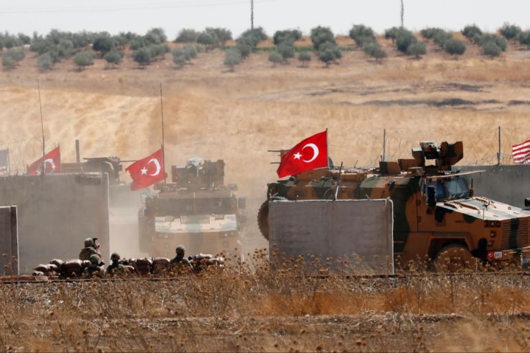 Turkish troops return after a joint U.S.-Turkey patrol in northern Syria, as it is pictured from near the Turkish town of Akcakale, Turkey, September 8, 2019. REUTERS/Murad Sezer