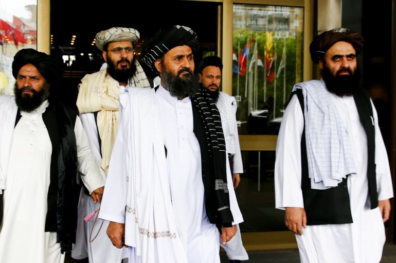 Afghan talks with Taliban in Moscow- - MOSCOW, RUSSIA - MAY 30: Representatives led by Mullah Abdul Ghani Baradar (Front C) leave after a meeting chaired by Former President of Afghanistan Hamid Karzai, marking a century of diplomatic relations between Afghanistan and Russia on May 30, 2019 in Moscow, Russia on the third day of Afghan talks with Taliban.