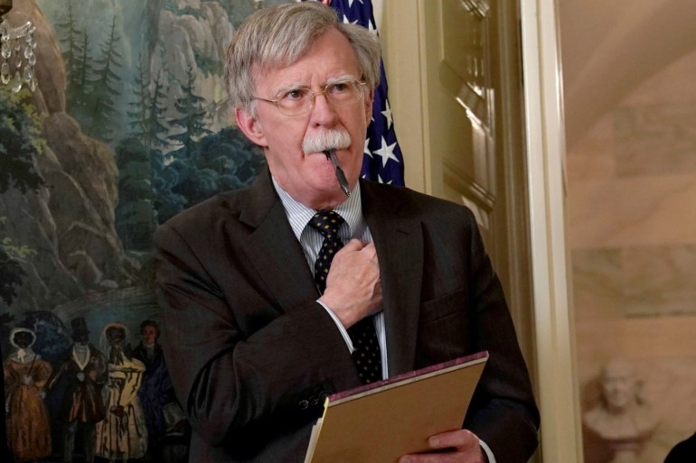 National Security Adviser John Bolton listens to U.S. President Donald Trump's statement on Syria at the White House in Washington, U.S., April 13, 2018. Picture taken April 13, 2018. REUTERS/Yuri Gripas