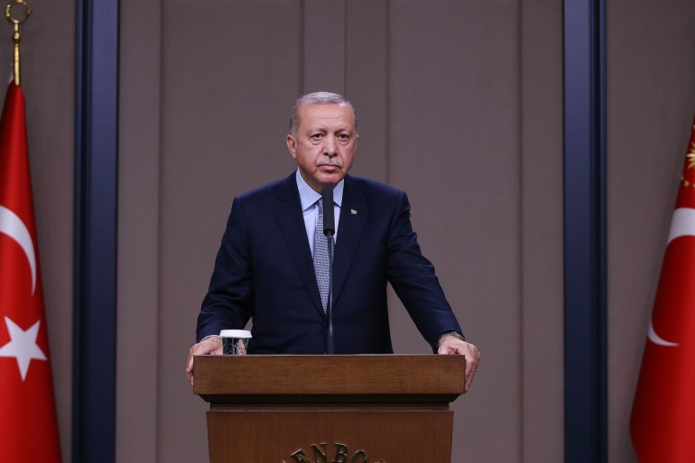 President of Turkey Recep Tayyip Erdogan- - ANKARA, TURKEY - OCTOBER 22 : President of Turkey, Recep Tayyip Erdogan gives a news conference ahead of his departure to Russia at Esenboga Airport in Ankara, Turkey on October 22, 2019.