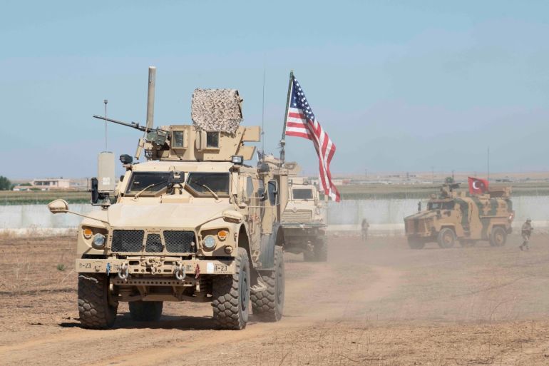 U.S. and Turkish military forces conduct a joint ground patrol inside the security mechanism area in northeast, Syria, September 8, 2019. Picture taken September 8, 2019. U.S. Army/Spc. Alec Dionne/Handout via REUTERS. THIS IMAGE HAS BEEN SUPPLIED BY A THIRD PARTY.