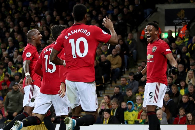 Soccer Football - Premier League - Norwich City v Manchester United - Carrow Road, Norwich, Britain - October 27, 2019 Manchester United's Anthony Martial celebrates scoring their third goal with team mates REUTERS/Chris Radburn EDITORIAL USE ONLY. No use with unauthorized audio, video, data, fixture lists, club/league logos or