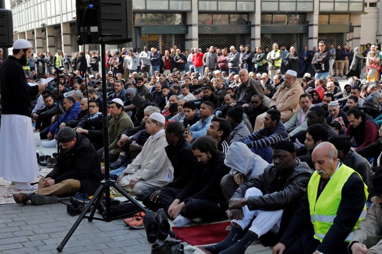 Muslims pray during Friday prayers in the street in front of the city hall of Clichy, near Paris, France, April 21, 2017, after an unauthorised place of worship was closed by local authorities. REUTERS/Benoit Tessier