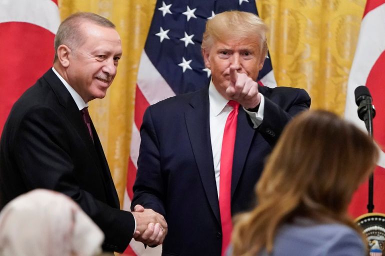 U.S. President Donald Trump greets Turkey's President Tayyip Erdogan after a joint news conference at the White House in Washington, U.S., November 13, 2019. REUTERS/Joshua Roberts