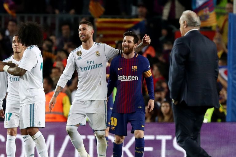 Soccer Football - La Liga Santander - FC Barcelona v Real Madrid - Camp Nou, Barcelona, Spain - May 6, 2018 Barcelona's Lionel Messi with Real Madrid's Sergio Ramos at the end of the match REUTERS/Sergio Perez