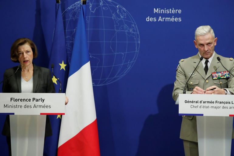 French Defense Minister Florence Parly and Chief of the Defense Staff of the French Army General Francois Lecointre attend a news conference in Paris, France, after thirteen French soldiers were killed in Mali when their helicopters collided at low altitude as they swooped in to support ground forces engaged in combat with Islamist militants. REUTERS/Benoit Tessier
