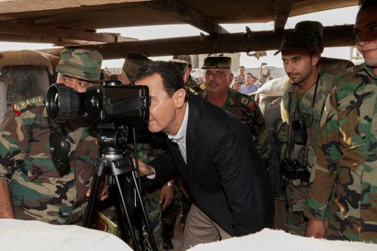 Syrian President Bashar al Assad visits Syrian army troops in war-torn northwestern Idlib province, Syria, in this handout released by SANA on October 22, 2019. SANA/Handout via REUTERS ATTENTION EDITORS - THIS IMAGE WAS PROVIDED BY A THIRD PARTY. REUTERS IS UNABLE TO INDEPENDENTLY VERIFY THIS IMAGE. TPX IMAGES OF THE DAY