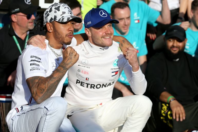 AUSTIN, TEXAS - NOVEMBER 03: 2019 Formula One World Drivers Champion Lewis Hamilton of Great Britain and Mercedes GP and race winner Valtteri Bottas of Finland and Mercedes GP celebrate after the F1 Grand Prix of USA at Circuit of The Americas on November 03, 2019 in Austin, Texas. Charles Coates/Getty Images/AFP== FOR NEWSPAPERS, INTERNET, TELCOS & TELEVISION USE ONLY ==