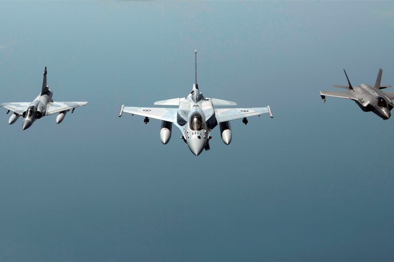 A United Arab Emirates Air Force Mirage 2000 (L), UAE F-16 Desert Falcon (C) and a U.S. F-35A Lightning II (R) fly a partnering flight in the U.S. Central Command area of responsibility, in the Arabian Gulf, May 29, 2019. Picture taken May 29, 2019. Chris Drzazgowski/U.S. Navy/Handout via REUTERS ATTENTION EDITORS- THIS IMAGE HAS BEEN SUPPLIED BY A THIRD PARTY.