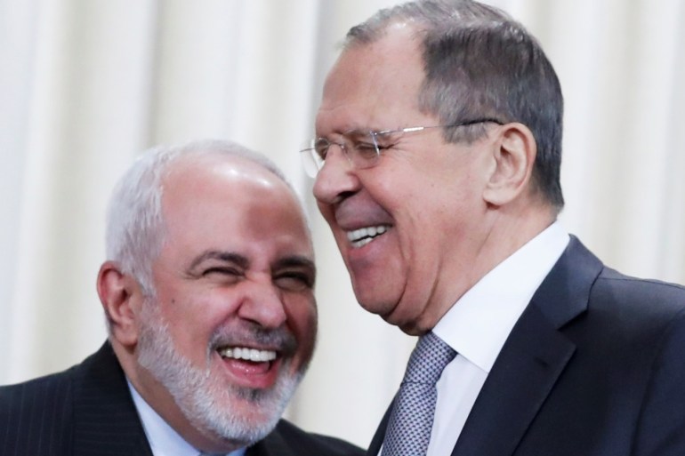 Iran's Foreign Minister Mohammad Javad Zarif and Russia's Foreign Minister Sergei Lavrov react after a news conference following their meeting in Moscow, Russia, December 30, 2019. REUTERS/Evgenia Novozhenina