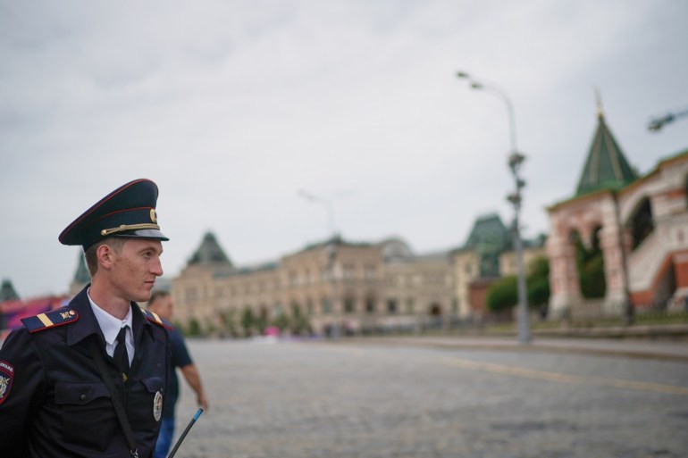 MOSCOW, RUSSIA - JUNE 12: A policeman guards Red Square ahead of the World Cup on June 12, 2018 in Moscow, Russia. Moscow and Russia are gearing up for the start of the World Cup tournament. FIFA expects more than three billion viewers for the World Cup that begins this week in Russia. (Photo by Christopher Furlong/Getty Images)