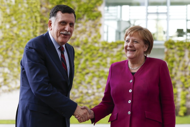 Chairman of the Presidential Council of Libya Fayez al-Sarraj in Berlin- - BERLIN, GERMANY - MAY 07: Chairman of the Presidential Council of Libya Fayez al-Sarraj (L) is welcomed by German Chancellor Angela Merkel (R) in Berlin, Germany on May 07, 2019.
