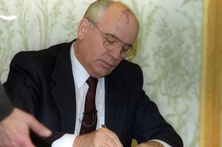 Soviet President Mikhail Gorbachev signs his resignation minutes before a live address on national television on December 25, 1991. Gorbachav said he was resigning after almost seven years as leader of the Soviet Union. Reuters/Gannady Galparin GG