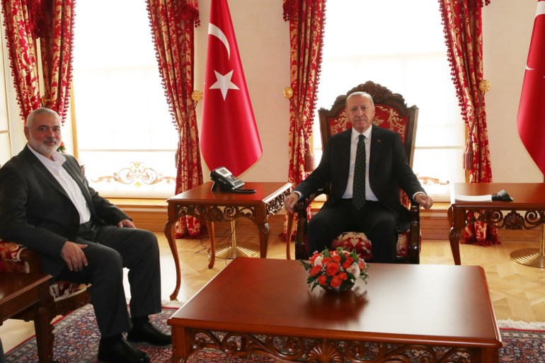 Turkish President Recep Tayyip Erdogan- - ISTANBUL, TURKEY - DECEMBER 14: Turkish President Recep Tayyip Erdogan (R) meets with Head of the Political Bureau of Hamas Ismail Haniyeh (L) at the Dolmabahce Office in Istanbul, Turkey on December 14, 2019.