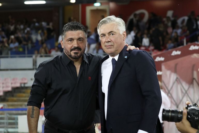 NAPLES, ITALY - AUGUST 25: Coach of SSC Napoli Carlo Ancelotti greets coach of AC Milan Gennaro Gattuso before the serie A match between SSC Napoli and AC Milan at Stadio San Paolo on August 25, 2018 in Naples, Italy. (Photo by Francesco Pecoraro/Getty Images)