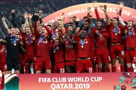 DOHA, QATAR - DECEMBER 21: Jordan Henderson of Liverpool lifts the FIFA Club World Cup trophy following his team's victory during the FIFA Club World Cup Qatar 2019 Final between Liverpool FC and CR Flamengo at Education City Stadium on December 21, 2019 in Doha, Qatar. (Photo by Francois Nel/Getty Images)