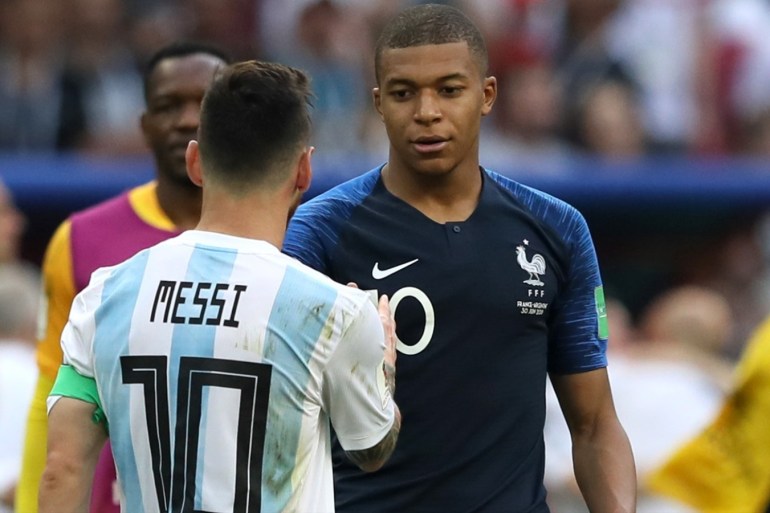 KAZAN, RUSSIA - JUNE 30: Kylian Mbappe of France consoles Lionel Messi of Argentina following France's victory in the 2018 FIFA World Cup Russia Round of 16 match between France and Argentina at Kazan Arena on June 30, 2018 in Kazan, Russia. (Photo by Kevin C. Cox/Getty Images)