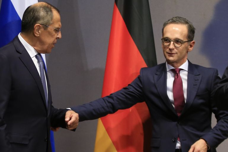 Russian Foreign Minister Sergey Lavrov in Berlin- - BERLIN, GERMANY - SEPTEMBER 14: Foreign Minister of Germany Heiko Maas (R) and Russian Foreign Minister Sergey Lavrov (lL) attend the ceremonial conclusion of a year-long initiative to forge partnerships between cities in Russia and Germany, in Berlin, Germany on September 14, 2018.