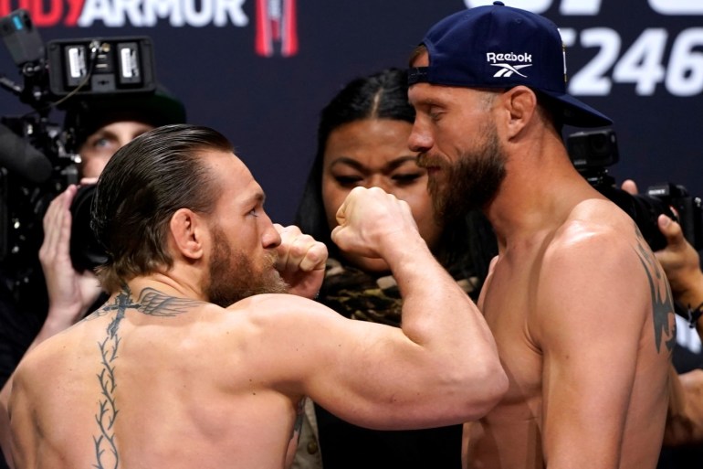 MMA Mixed Martial Arts - UFC 246 - Welterweight - Conor McGregor v Donald Cerrone Weigh-In - Pearl Theater, Palms Resort Casino, Las Vegas, United States - January 17, 2020 Conor McGregor and Donald Cerrone go head to head during the weigh-in REUTERS/Mike Blake