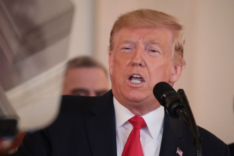 US President Donald Trump press conference- - WASHINGTON DC, USA - JANUARY 8: US President Donald Trump speaks about the situation with Iran in the Grand Foyer of the White House in Washington DC, United States ,on January 8, 2020.