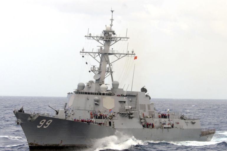 The guided-missile destroyer USS Farragut is shown in this undated photo operating in heavy seas in the Atlantic Ocean. Iranian forces boarded a Marshall Islands-flagged cargo ship in the Gulf on Tuesday after patrol boats fired warning shots across its bow and ordered it deeper into Iranian waters, the Pentagon said. The closest U.S. warship was more than 60 miles away, he said, and the U.S. military instructed destroyer USS Farragut to head towards the cargo ship, wh
