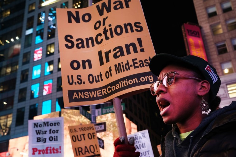 NEW YORK CITY, - JANUARY 08: People participate in a protest in Times Square against military conflict with Iran on January 08, 2020 in New York City, United States. The