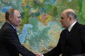 俄罗斯总统普京（左）选择了几乎没有政治背景的前俄联邦税务局局长的米舒斯京（右）担任他的新总理（路透社）