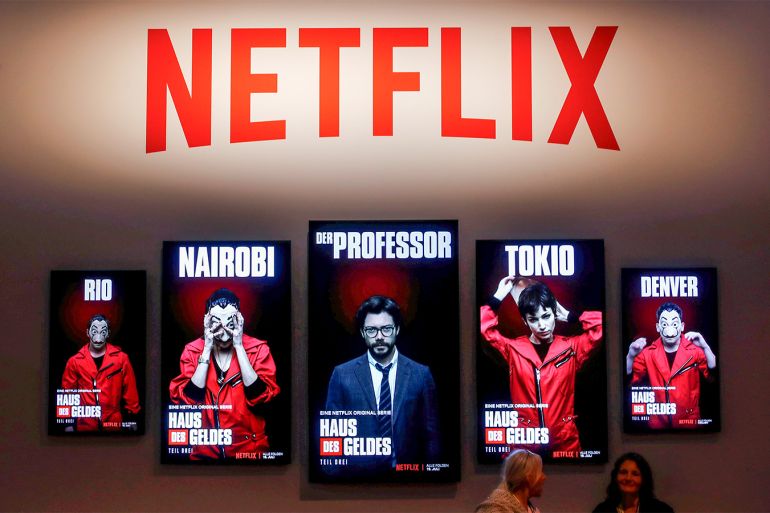 The Netflix series Money Heist is advertised at the booth of Netflix during Europe's leading digital games fair Gamescom, which showcases the latest trends of the computer gaming scene in Cologne, Germany, August 21, 2019. REUTERS/Wolfgang Rattay