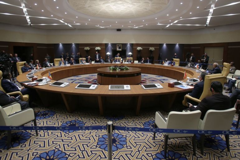 Foreign Ministers and officials from countries neighbouring Libya hold a meeting to discuss the conflict in Libya, in Algiers Algeria January 23, 2020. REUTERS/Ramzi Boudina