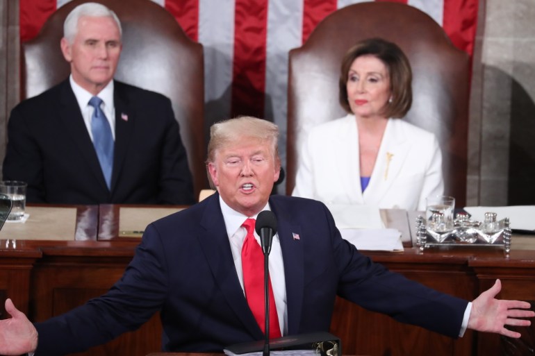 epa08193588 US President Donald J. Trump (B) delivers his State of the Union address in front of Vice President Mike Pence (L) and Speaker of the House Nancy Pelosi during a joint session of congress in the House chamber of the US Capitol in Washington, DC, USA 04 February 2020. President Trump delivers his address as his impeachment trial is coming to an end with a final vote on the 2 articles of impeachment scheduled for 05 February. EPA-EFE/MICHAEL REYNOLDS