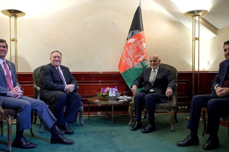 U.S. Secretary of State Mike Pompeo (2nd L) meets with Afghan President Ashraf Ghani, together with U.S. Secretary of Defense Mark Esper (L) and Acting Minister of Defense of Afghanistan Asadullah Khalid (R), during the Munich Security conference in Munich, southern Germany February 14, 2020. Andrew Caballero-Reynolds/Pool via REUTERS