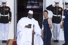(FILE) - A file picture dated 05 August 2014 shows Gambian President Yahya Jammeh (L) and First Lady Zeinab Suma Jammeh (R) arrive at the North Portico of the White House in Washington DC, USA. Gambia on 17 January 2017 declared a state of emergency to last for 90 days, just two days before Jammeh was to step down despite rejecting the 01 December 2016's election outcome which saw Adama Barrow winning.