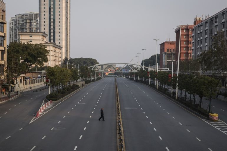 WUHAN, CHINA - FEBRUARY 03: (CHINA OUT) A man cross an empty highway road on February 3, 2020 in Wuhan, Hubei province, China. The number of those who have died from the Wuhan coronavirus, known as 2019-nCoV, in China climbed to 361 and cases have been reported in other countries including the United States, Canada, Australia, Japan, South Korea, India, the United Kingdom, Germany, France, and several others. (Photo by Getty Images)