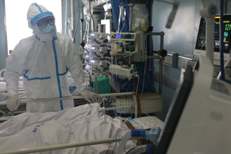 A medical worker is seen at the intensive care unit (ICU) of Jinyintan hospital in Wuhan, the epicentre of the novel coronavirus outbreak, in Hubei province, China February 13, 2020. Picture taken February 13, 2020. China Daily via REUTERS ATTENTION EDITORS - THIS IMAGE WAS PROVIDED BY A THIRD PARTY. CHINA OUT.